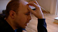Karl Pilkington gesticulates