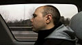 Karl in a motorcar